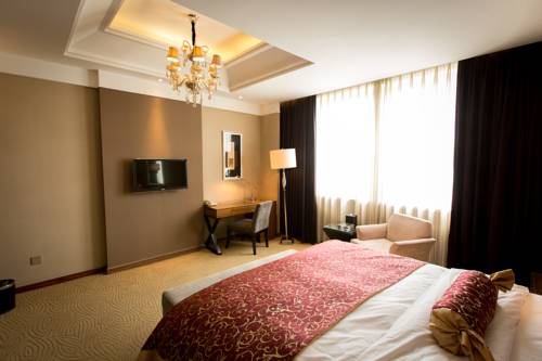 Imagen de la habitación del Hotel Zhangjiagang Guomao, Zhangjiagang. Foto 4