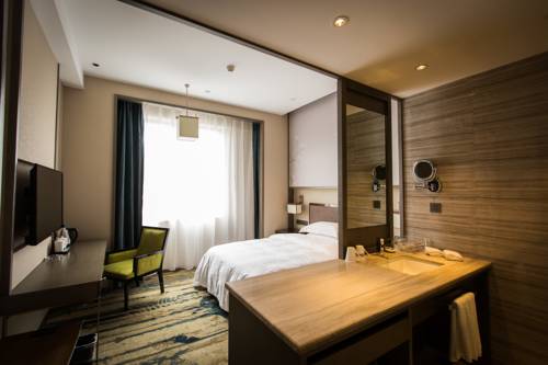 Imagen de la habitación del Hotel Zhangjiagang Guomao, Zhangjiagang. Foto 5
