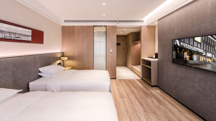 Imagen de la habitación del Hotel Zhangjiagang Suning Auraya. Foto 2