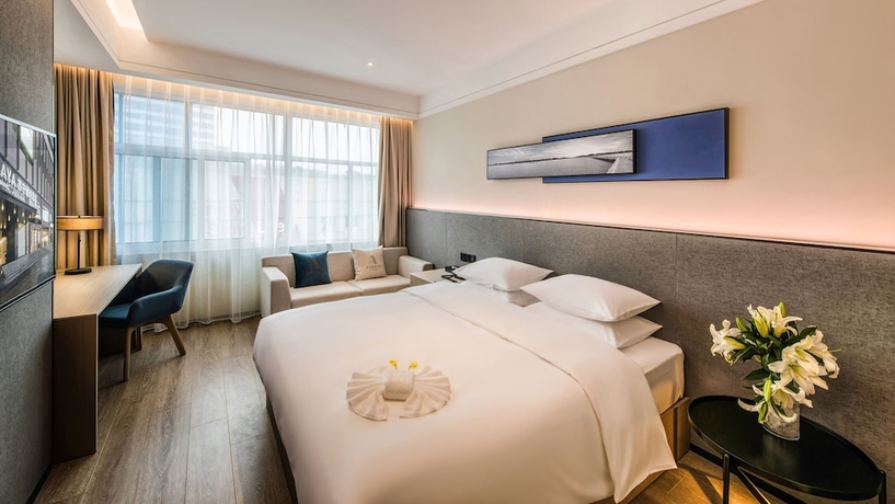 Imagen de la habitación del Hotel Zhangjiagang Suning Auraya. Foto 4