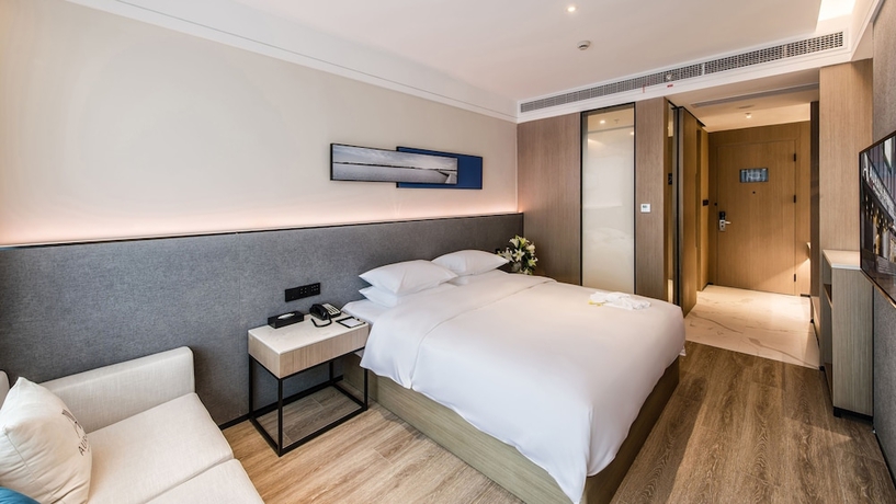 Imagen de la habitación del Hotel Zhangjiagang Suning Auraya. Foto 5