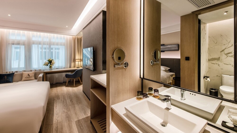 Imagen de la habitación del Hotel Zhangjiagang Suning Auraya. Foto 6