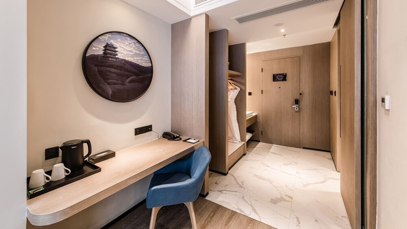 Imagen de la habitación del Hotel Zhangjiagang Suning Auraya. Foto 8