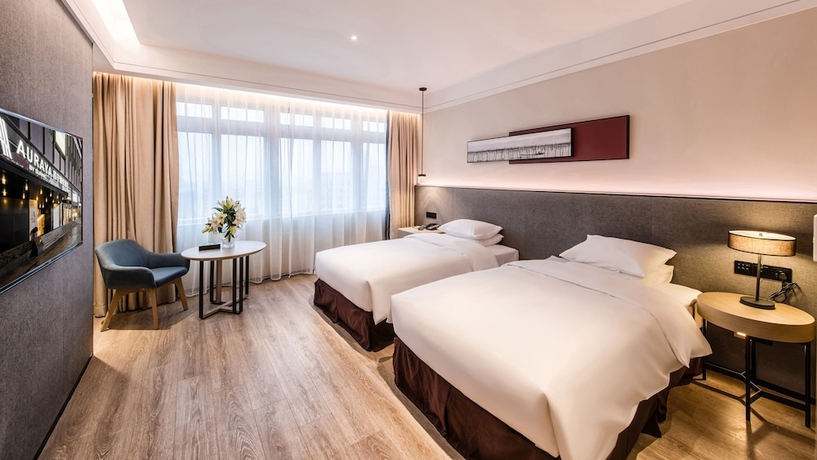 Imagen de la habitación del Hotel Zhangjiagang Suning Auraya. Foto 10