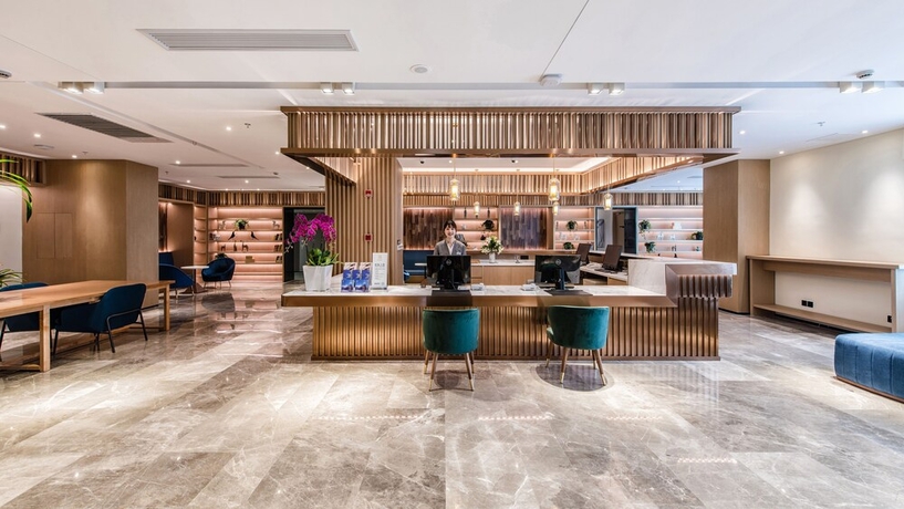 Imagen de los interiores del Hotel Zhangjiagang Suning Auraya. Foto 17