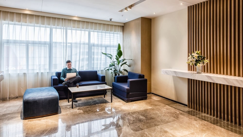 Imagen de los interiores del Hotel Zhangjiagang Suning Auraya. Foto 18