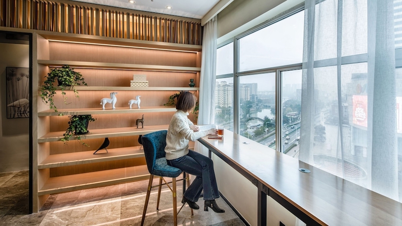 Imagen de los interiores del Hotel Zhangjiagang Suning Auraya. Foto 19