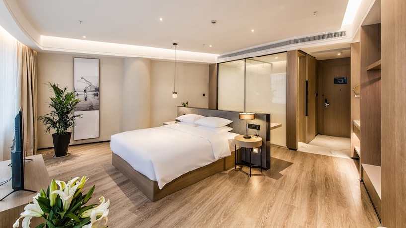 Imagen de la habitación del Hotel Zhangjiagang Suning Auraya. Foto 12