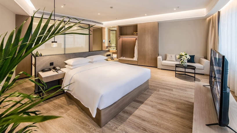 Imagen de la habitación del Hotel Zhangjiagang Suning Auraya. Foto 13