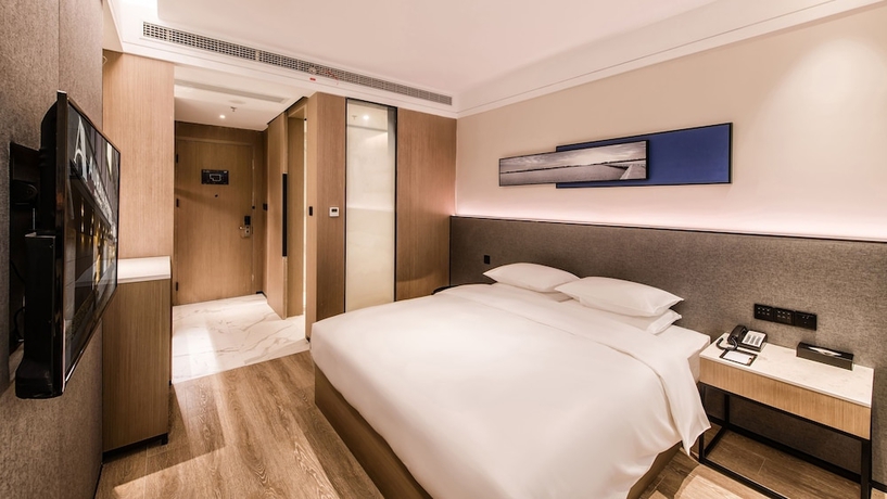 Imagen de la habitación del Hotel Zhangjiagang Suning Auraya. Foto 14