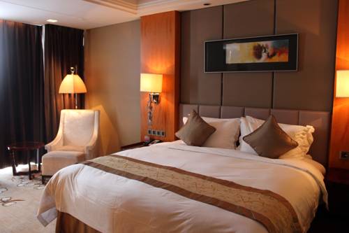 Imagen de la habitación del Hotel Zhangjiagang Zhonglian Gdh International. Foto 2