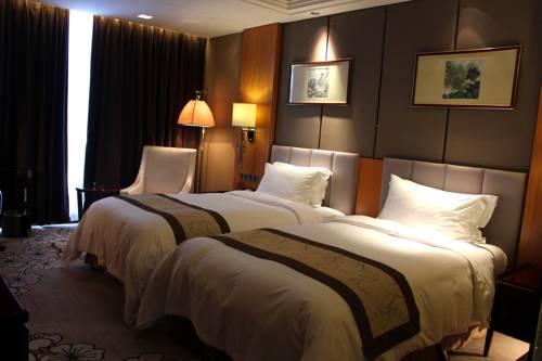 Imagen de la habitación del Hotel Zhangjiagang Zhonglian Gdh International. Foto 3