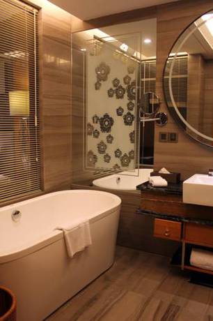 Imagen de la habitación del Hotel Zhangjiagang Zhonglian Gdh International. Foto 6