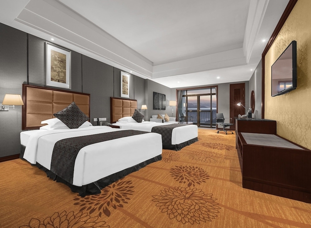 Imagen de la habitación del Hotel Zhangjiajie Country Garden Phoenix Suites. Foto 5