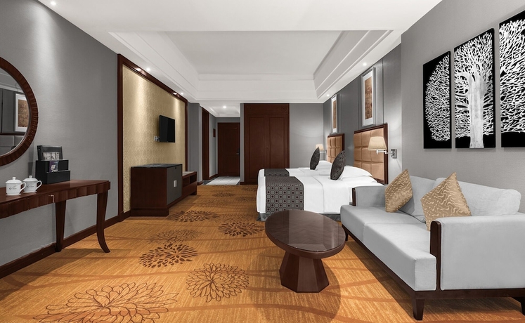 Imagen de la habitación del Hotel Zhangjiajie Country Garden Phoenix Suites. Foto 6
