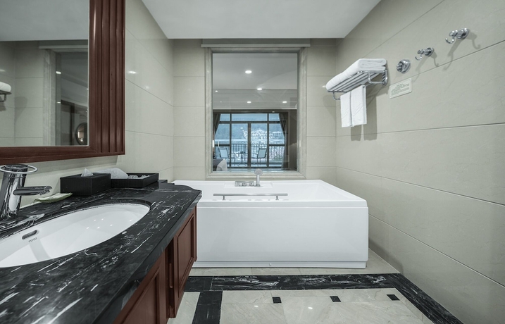 Imagen de la habitación del Hotel Zhangjiajie Country Garden Phoenix Suites. Foto 8