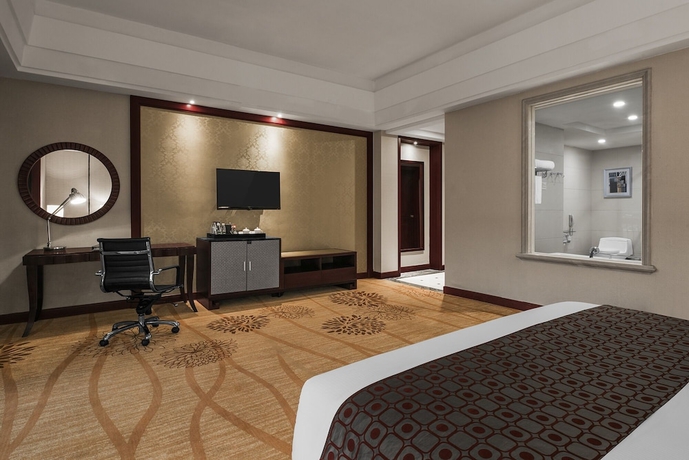 Imagen de la habitación del Hotel Zhangjiajie Country Garden Phoenix Suites. Foto 10