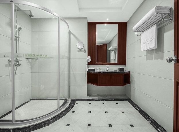 Imagen de la habitación del Hotel Zhangjiajie Country Garden Phoenix Suites. Foto 12