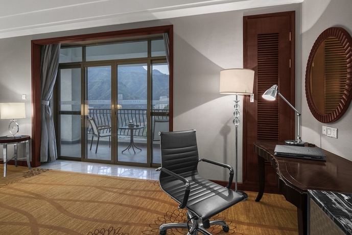 Imagen de la habitación del Hotel Zhangjiajie Country Garden Phoenix Suites. Foto 14