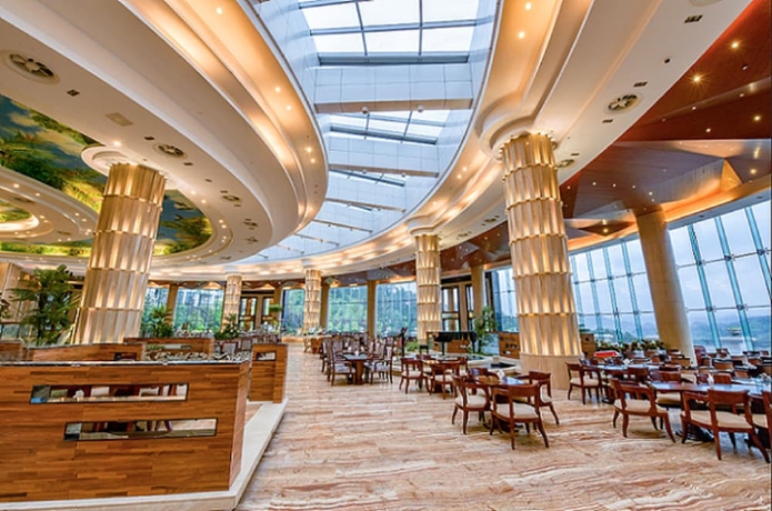 Imagen del bar/restaurante del Hotel Zhangjiajie Country Garden Phoenix Suites. Foto 3