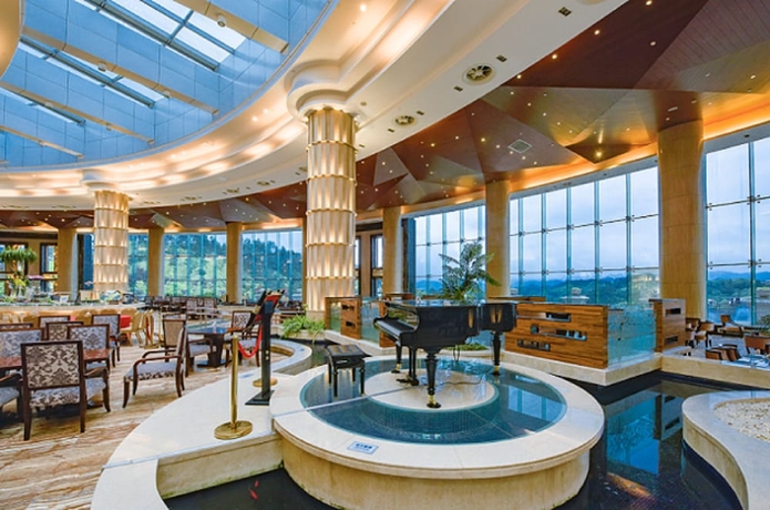 Imagen del bar/restaurante del Hotel Zhangjiajie Country Garden Phoenix Suites. Foto 4