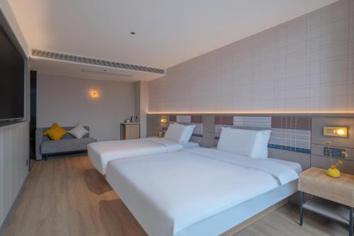 Imagen general del Hotel Zhangjiajie Homeinn Plus. Foto 3