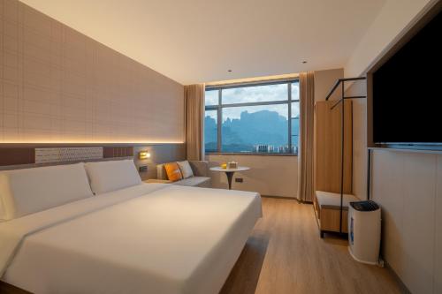 Imagen general del Hotel Zhangjiajie Homeinn Plus. Foto 7