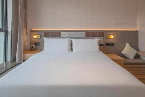Imagen de la habitación del Hotel Zhangjiajie Homeinn Plus. Foto 17