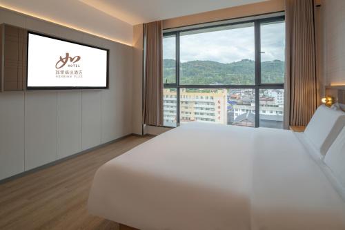 Imagen de la habitación del Hotel Zhangjiajie Homeinn Plus. Foto 19