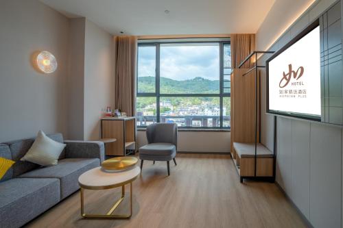 Imagen de la habitación del Hotel Zhangjiajie Homeinn Plus. Foto 20