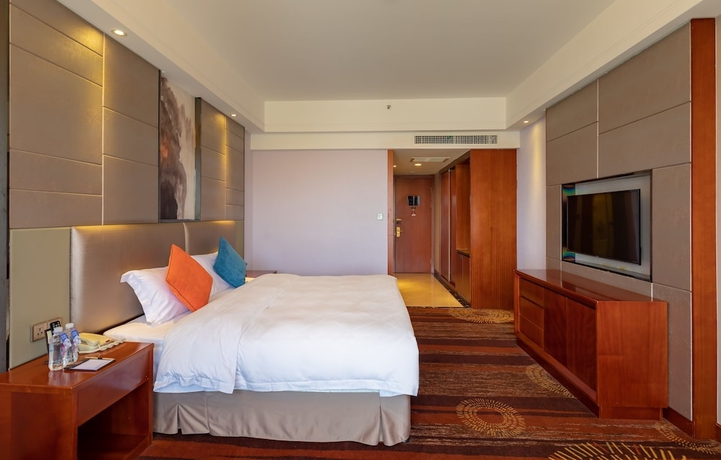 Imagen de la habitación del Hotel Zhangjiajie Huatian. Foto 4