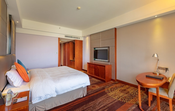 Imagen de la habitación del Hotel Zhangjiajie Huatian. Foto 5