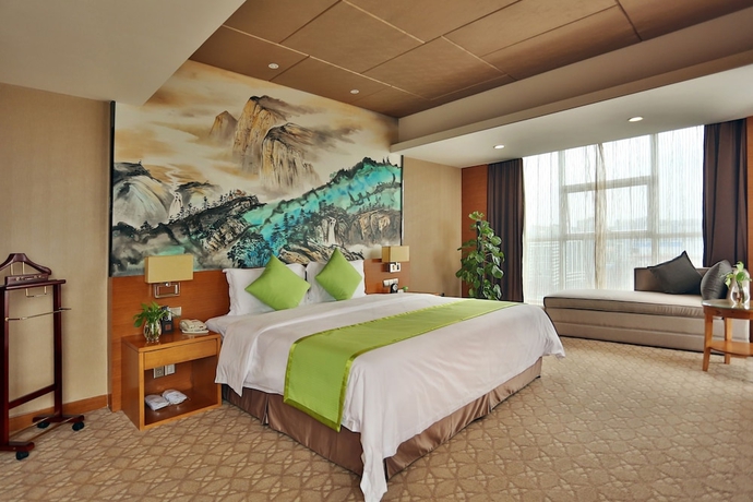 Imagen de la habitación del Hotel Zhangjiajie Huatian. Foto 10