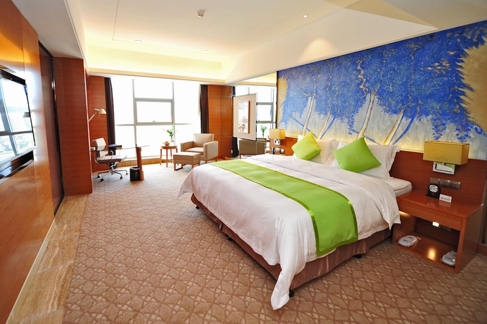 Imagen de la habitación del Hotel Zhangjiajie Huatian. Foto 12