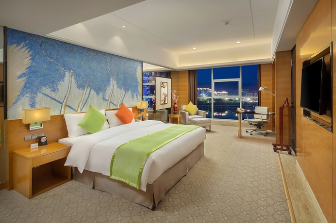 Imagen de la habitación del Hotel Zhangjiajie Huatian. Foto 13