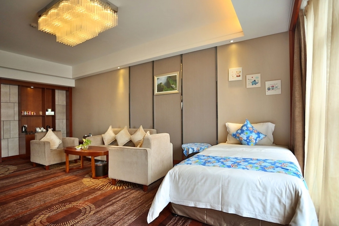 Imagen de la habitación del Hotel Zhangjiajie Huatian. Foto 16
