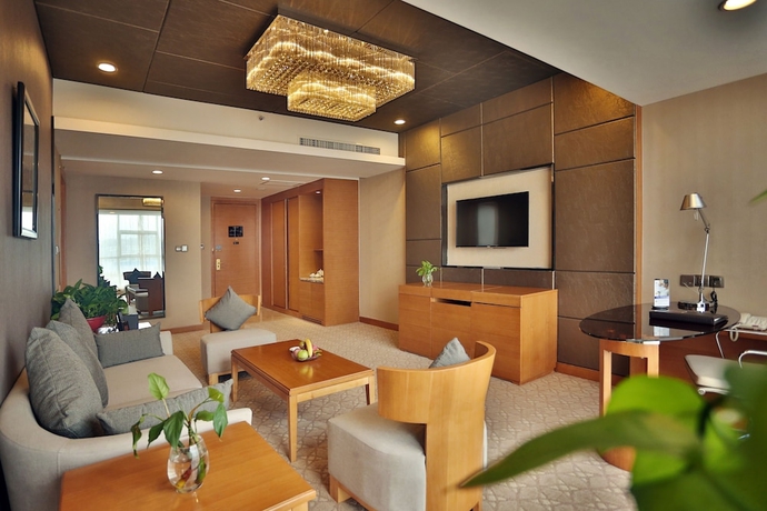 Imagen de la habitación del Hotel Zhangjiajie Huatian. Foto 17