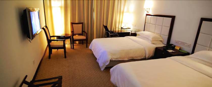 Imagen de la habitación del Hotel Zhangjiajie Jiang Han. Foto 7