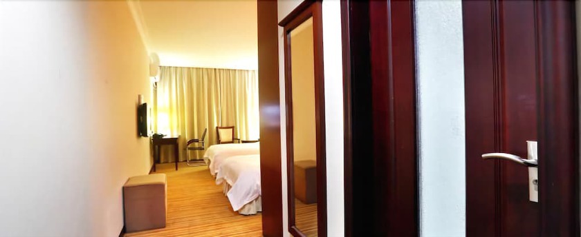 Imagen de la habitación del Hotel Zhangjiajie Jiang Han. Foto 8