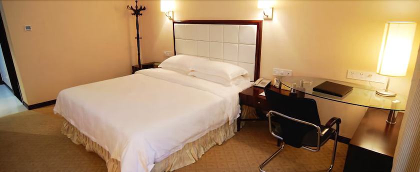 Imagen de la habitación del Hotel Zhangjiajie Jiang Han. Foto 9