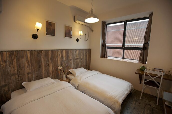 Imagen de la habitación del Hotel Zhangjiajie MINI Inn. Foto 11