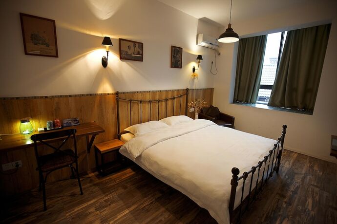 Imagen de la habitación del Hotel Zhangjiajie MINI Inn. Foto 13