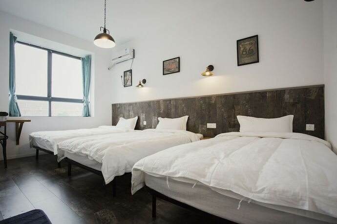 Imagen de la habitación del Hotel Zhangjiajie MINI Inn. Foto 14