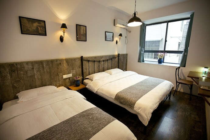 Imagen de la habitación del Hotel Zhangjiajie MINI Inn. Foto 15