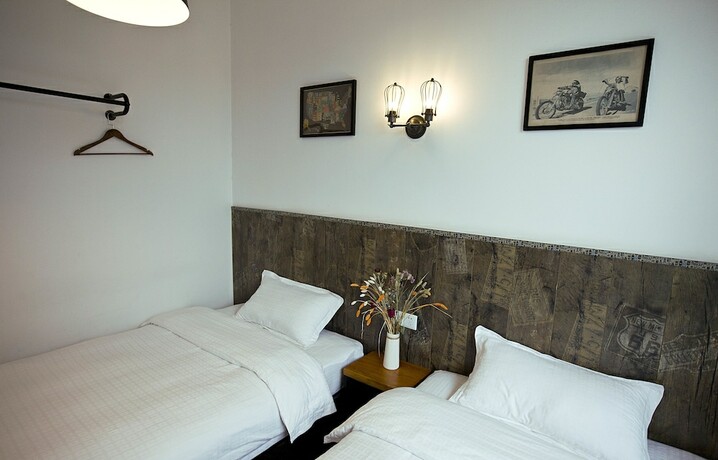 Imagen de la habitación del Hotel Zhangjiajie MINI Inn. Foto 18