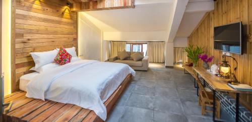 Imagen general del Hotel Zhangjiajie Maosao Inn. Foto 3