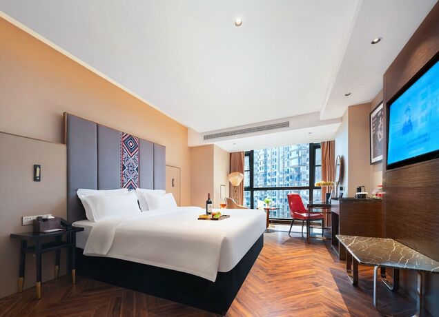 Imagen de la habitación del Hotel Zhangjiajie Metropolo. Foto 13