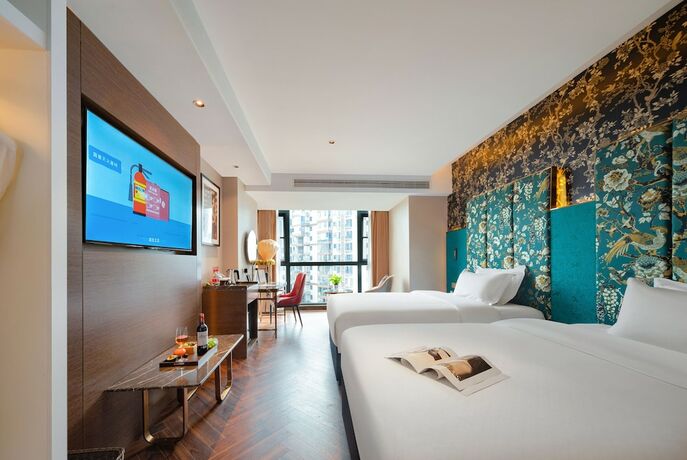 Imagen de la habitación del Hotel Zhangjiajie Metropolo. Foto 15