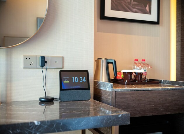 Imagen de la habitación del Hotel Zhangjiajie Metropolo. Foto 21