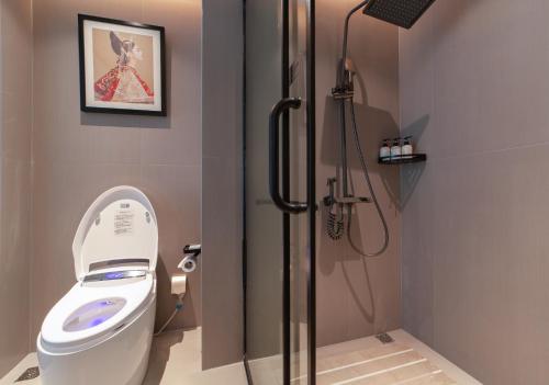 Imagen de la habitación del Hotel Zhangjiajie Metropolo, ZHANGJIAJIE. Foto 18